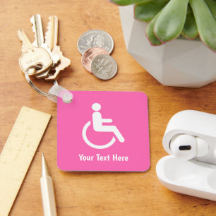 Llavero Silla de ruedas rosa – Conciencia sobre accesibili