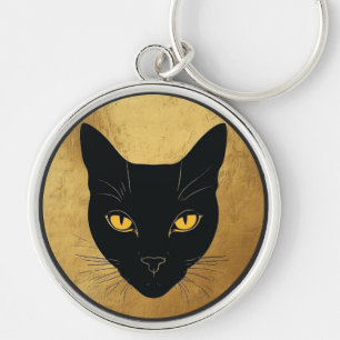 Llavero Silueta de gato negro contra un círculo dorado