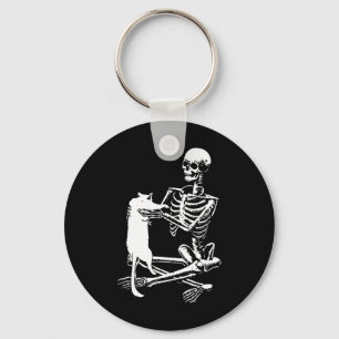 Llavero Skeleton Sujetando Un Desfile De Ropa De Halloween