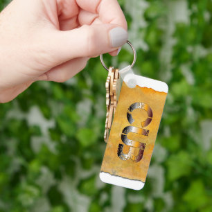 Llavero SlipperyJoe's cub word naranja-tonos marrones pro