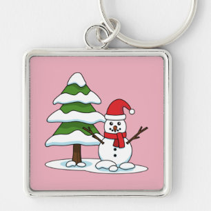 Llavero Snowman con un árbol de pino con nieve