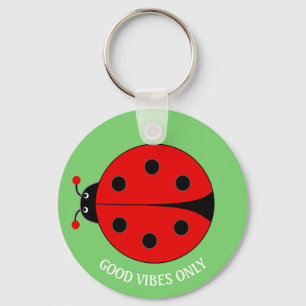 Llavero Solo buenas vibras Dama Bug en verde lima