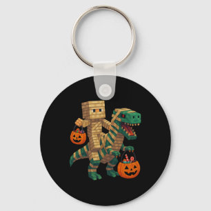 Llavero Steve montando dinosaurio T Rex momia Halloween di