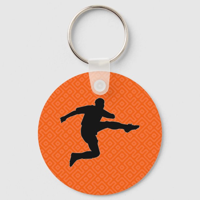 Llavero Striker de fútbol sobre patrón geométrico Naranja  (Reverso )