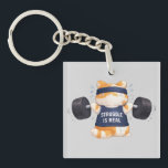 Llavero Struggle is Real<br><div class="desc">The cat is struggling and giving its absolute all to lift the heavy weight; sweat is pouring down,  but the struggle finally pays off</div>