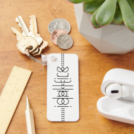 Llavero Su nombre como glifos alienígenas blancos