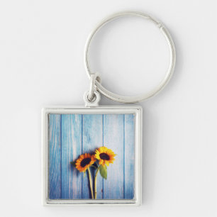 Llavero Sunflower on Blue Wood Wall