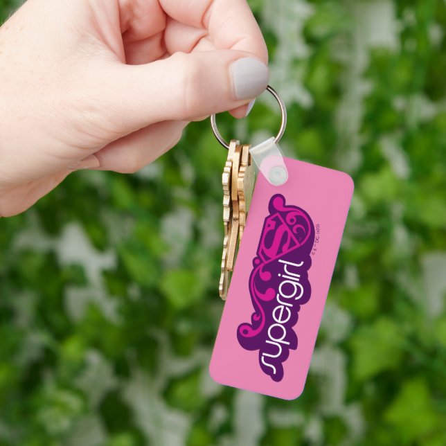 Llavero Supergirl Groovy Name y S-Shield (Mano)