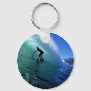 Llavero Surfista surcando el tubo en onda verde
