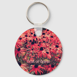 Llavero Susan Flowers con ojos negros rosados personalizad