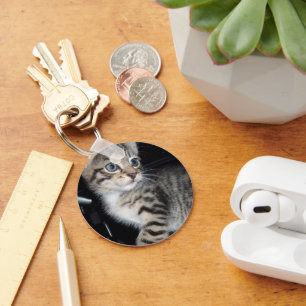 Llavero "Susurros de problemas: el gatito travieso