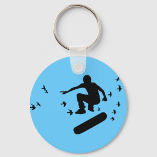 Llavero tablero de patines con llave de aves