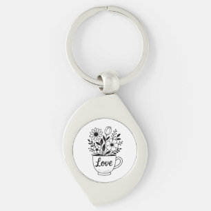 Llavero Té negro de bonito con diseño de flores