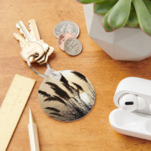 Tecla del botón de apertura