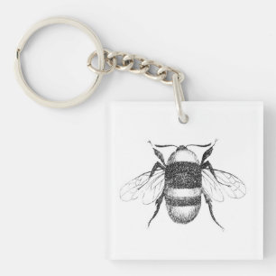 Llavero Tecla para dibujar abejas blancas y negras