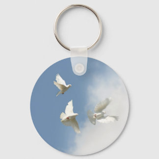 Llavero Teclado de palomas blancas voladoras