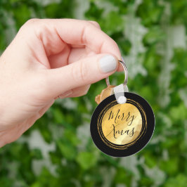 Llavero texto metálico negro y dorado de feliz Navidad