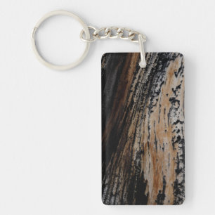 Llavero Textura de corteza de árbol quemada