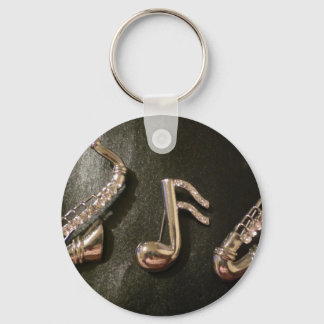 Llavero Toca una nota musical sobre ese Saxaphone
