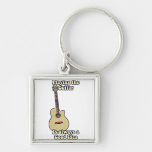 Llavero Tocar la guitarra es siempre una buena idea.