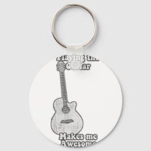 Llavero Tocar la guitarra me hace increíble. blanco y negr