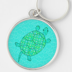Llavero Tortuga en espiral arabesca - tonos de verde mar