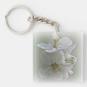 Llavero tres flores blancas