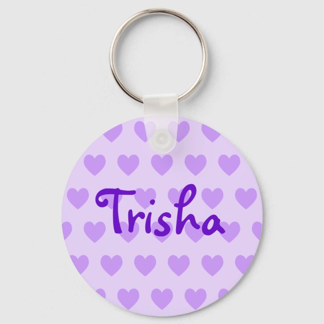 Llavero Trisha en morado (Anverso)