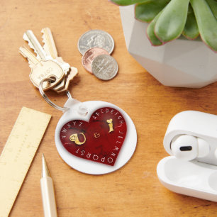 Llavero Tú y yo - juego de alfabeto en un corazón rojo