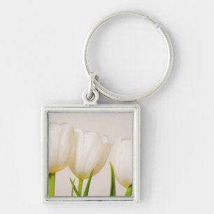 Llavero Tulipanes blancos sobre fondo blanco,