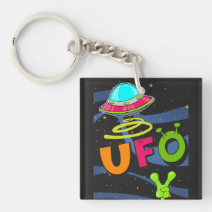 Llavero Ufo en el espacio saluda