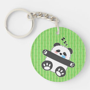 Llavero Un adorable bebé panda durmiendo pacíficamente