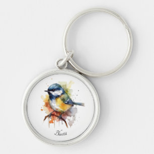 Llavero Un bluetit lindo sentado en una acuarela de rama