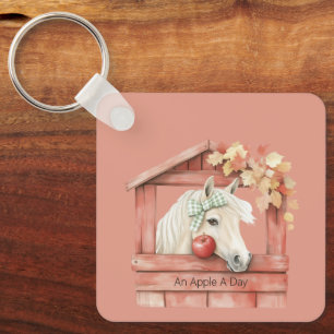 Llavero Un caballo blanco una manzana al día