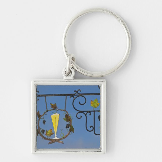 Llavero Un cartel de hierro forjado que ilustra el tema (Frente)