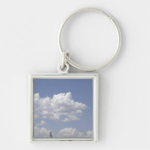 Llavero Un CV-22 Osprey vuela sobre A.C. - 130 Hércules