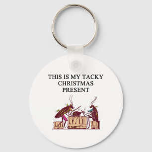 Llavero un diseño pegajoso del regalo del navidad
