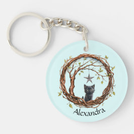 Llavero Un gatito negro lindo mirando una estrella