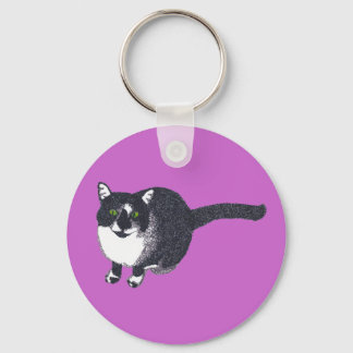 Llavero Un gato blanco negro lindo en las cadenas del punt