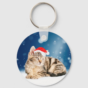 Llavero Un gato lindo vestido con Navidades de sombrero ro
