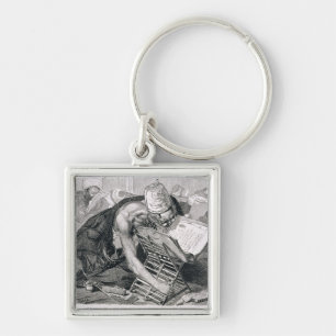 Llavero Un hombre docto absorbente en el Koran