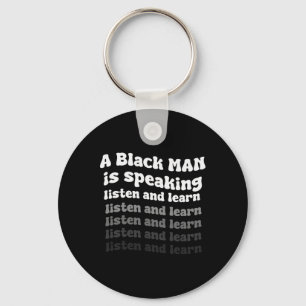 Llavero Un hombre negro está hablando Escucha y aprende ne