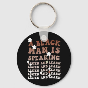 Llavero Un hombre negro habla, escucha y aprende su negro