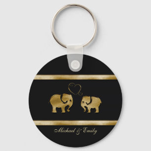 Llavero Un lindo y moderno elefante negro/dorado enamorado