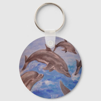 Llavero Un pote de delfines juguetones