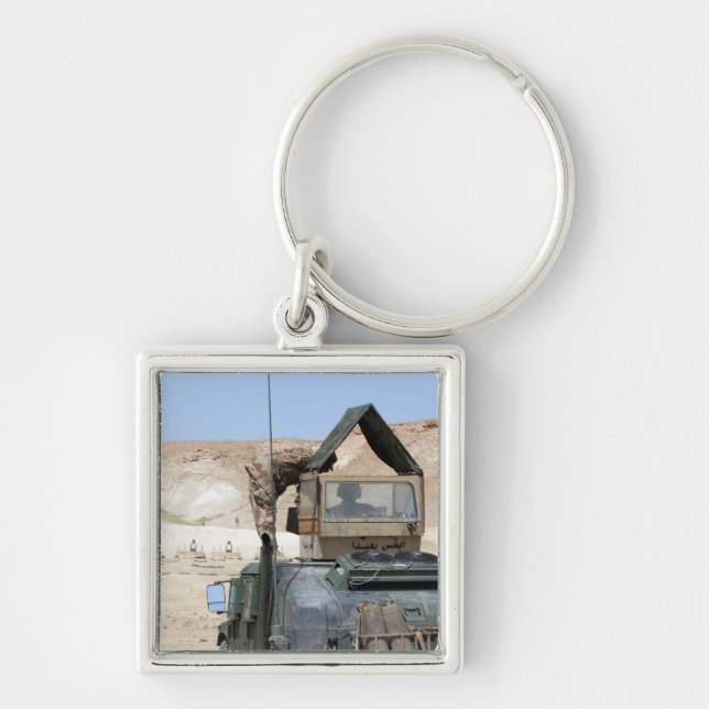 Llavero Un soldado da instrucciones a un soldado del ejérc (Frente)