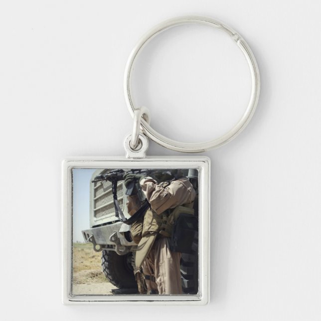 Llavero Un soldado proporciona seguridad a los marines (Frente)