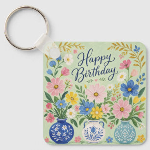 Llavero Un trío de flores de cumpleaños