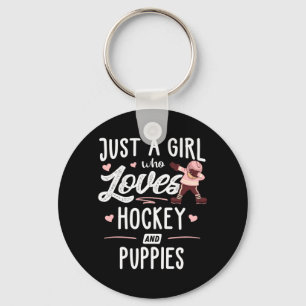 Llavero Una chica que ama el hockey y los cachorros regalo