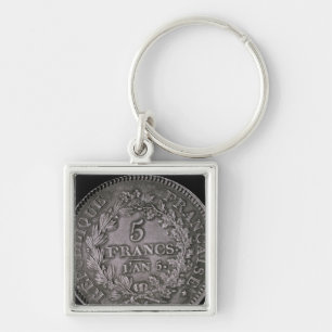 Llavero Una libra de veinte soles